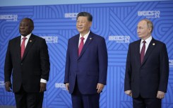 File: South African President Cyril Ramaphosa, Chinese President Xi Jinping and Russian President Vladimir Putin pose for a family photo during the BRICS summit in Kazan on October 23, 2024.
