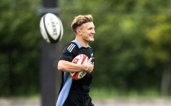 New Zealand's Damian McKenzie takes part in a training session. AFP/Philip Fong