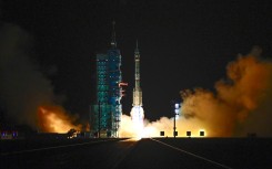 A long March-2F carrier rocket carrying the Shenzhou-19 spacecraft and crew of three astronauts lifts off from the Jiuquan Satellite Launch Center. AFP/Adek Berry