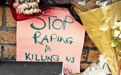 File: A sign left as a protest against gender violence at the scene of a rape and murder. GettyImages/RapidEye