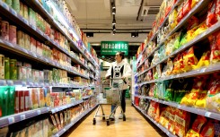 A consumer shops at a supermarket in Lianyungang. Wang Chun/Xinhua via AFP