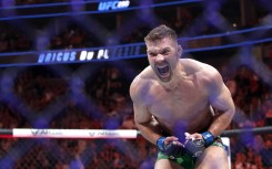 Dricus Du Plessis celebrates after defeating Robert Whittaker in a middleweight bout during UFC 290 at T-Mobile Arena on July 08, 2023 in Las Vegas, Nevada. 