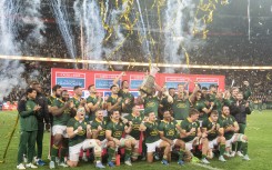 Springbok rugby team celebrates after defeating New Zealand at the end of the Rugby Championship Test match. AFP/Rodger Bosch