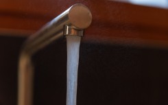 Water flows from a kitchen tap. Capucine Veuillet/Hans Lucas via AFP