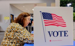 A voter fills out her ballot at a polling station in Ashburn, Virginia, on November 5, 2024. Voters in Ashburn, Virginia, participate in the 2024 U.S. Election, casting their ballots in a highly anticipated race between Kamala Harris and Donald Trump.