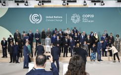 File: Participating world leaders and delegates arrive for a family photo during the United Nations Climate Change Conference (COP29) in Baku on November 12, 2024. 