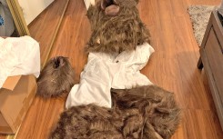 A bear costume found in the home of a suspect in an insurance fraud case.  AFP/California Department of Insurance