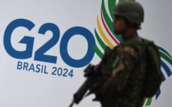File: A soldiers patrols the surroundings of the Museum of Modern Art ahead of the G20 Leaders Summit in Rio de Janeiro, Brazil on November 15, 2024. The G20 Leaders' Summit will take place in Rio de Janeiro between November 18 and 19, 2024.