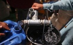Displaced Palestinians are filling jerrycans with water at a desalination plant in Deir el-Balah in the central Gaza Strip. Majdi Fathi/NurPhoto via AFP