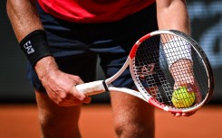 File: A tennis player with a tennis racket and ball. Matthieu Mirville/DPPI via AFP 
