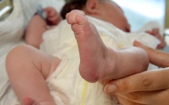 File: A newborn baby in hospital. Waltraud Grubitzsch/dpa via AFP