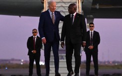 US President Joe Biden and Angola Foreign Affairs Minister Tete Antonio. AFP/Andrew Caballero-Reynolds