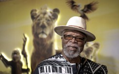 South African actor, director and playwright John Kani smiles during a photocall ahead South Africa’s premiere of Disney’s “Mufasa, the Lion King” in Johannesburg. AFP/Marco Longari