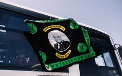 A flag of the Umkhonto We Sizwe (MKP) party sporting a picture of their leader Jacob Zuma. AFP/Rajesh Jantilal