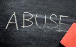 File: The word abuse written on a black board. GettyImages/sebastianosecondi