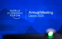 A sign of the World Economic Forum seen before the upcoming WEF annual meeting held in Davos. AFP/Fabrice Coffrini