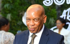 Minister of Electricity Kgosientso Ramokgopa looks on as he arrives at the Cape Town City Hall. AFP/Rodger Bosch