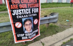 A poster calling for justice for Emaan Ghumman. eNCA/Ronald Masinda
