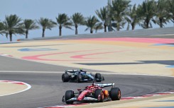 Ferrari's Charles Leclerc and Mercedes' Andrea Kimi Antonelli drive on the third day of the Formula One pre-season testing at the Bahrain International Circuit. AFP/Giuseppe Cacace
