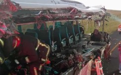 EMS workers seen in the bus following the accident. Supplied