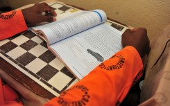 File: A prisoner busy studying. GettyImages/Nigel Jared