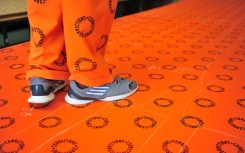 File: A prisoner with Correctional Services printed material. GettyImages/Nigel Jared