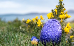 File: Chocolate Easter eggs hidden in a garden. Annabelle Hamil/Hans Lucas via AFP