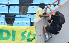 Mamelodi Sundowns fan saved Esperance Tunis fan from a fight with each other during the CAF Champions League 2024/25 match between Mamelodi Sundowns and Esperance de Tunis at Loftus Versfeld Stadium in Pretoria on the 01 April 2025 © Samuel Shivambu/BackpagePix