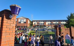 Supporters of Timothy Omotoso outside the Mdantsane police station. eNCA/Ronald Masinda
