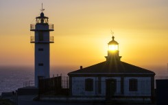 Lighthouse at dusk on the Costa da Morte in Galicia, Spain. Jean-Philippe Delobelle/Biosphoto via AFP