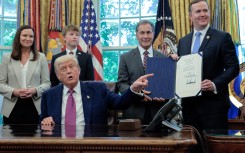US president Donald Trump signed Congressional resolutions into law in the Oval Office at the White House. Chip Somodevilla/Getty Images/AFP