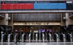 A man walks through Secaucus Junction Station in Secaucus, New Jersey, during a transit strike. AFP/Leonardo Munoz