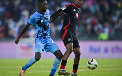 Patrick Maswanganyi of Orlando Pirates challenged by Lehlohonolo Mtshali of Magesi FC. BackpagePix/Alche Greeff