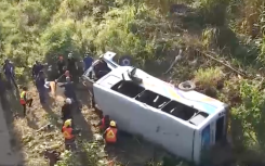Rescuers on the scene of the oThongathi bus crash.