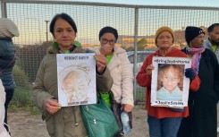 The community of Saldanha Bay outside court during the Joshlin kidnapping case