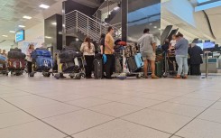 The first group of 49 Afrikaner 'refugees ' leaving South Africa for the US.