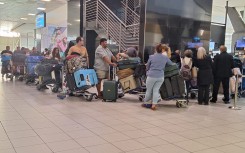 The first group of 49 Afrikaner 'refugees ' leaving South Africa for the US.