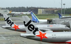 Jetstar Asia and Valuair berthed at Singapore Changi Airport in Singapore. AFP/Roslan Rahman