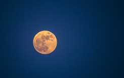 The full Strawberry moon. AFP/Khaled Desouki