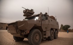 File: Soldiers patrol Timbuktu in front of the Great Mosque. AFP/Florent Vergnes