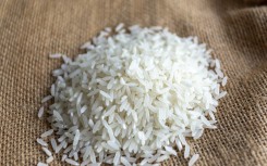 File: A handful of rice. Luis Boza/NurPhoto via AFP