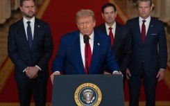 President Donald Trump delivers an address to the nation accompanied by U.S. Vice President JD Vance, U.S. Secretary of State Marco Rubio and U.S. Defense Secretary Pete Hegseth. AFP/Pool