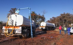 File: Water trucks being refilled at a Joburg water station. Gallo Images/Sharon Seretlo