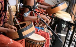 Musical instruments being played by musicians - Music