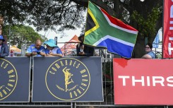 Fans with flags during the 2025 Comrades Marathon. Darren Stewart/Gallo Images