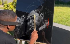 Sandile Kgaphola also known as SK Original with his art piece of Presley Chweneyagae.