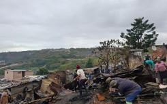 A fire at the Kennedy Road informal settlement gutted structures. eNCA