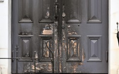 A photo shows the burnt front entrance of the East Melbourne Synagogue in Melbourne. AFP/William West