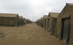 File: A row of military tents.GettyImages/Michael Wood/Stocktrek Images