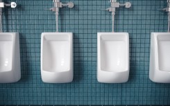 File: Four urinals in a public restroom. GettyImages/mevans